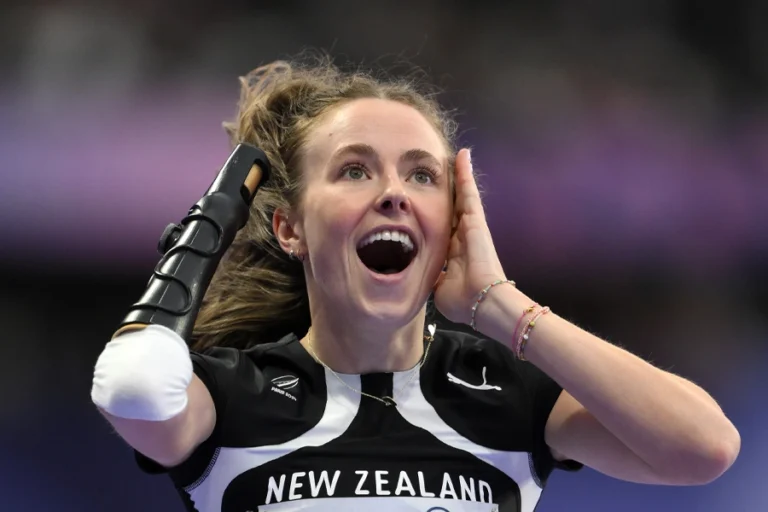 Anna Grimaldi celebrates following a sprint race at the Paris 2024 Paralympic Games.