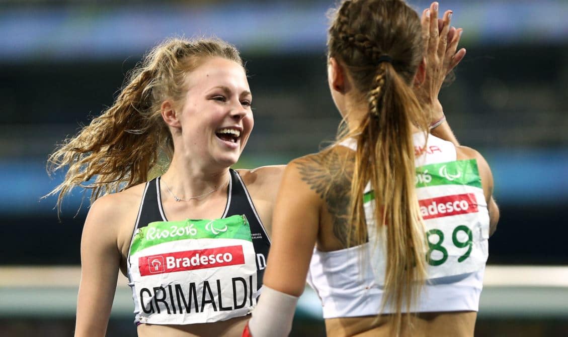 Anna Grimaldi high five other competitor after racing in Rio