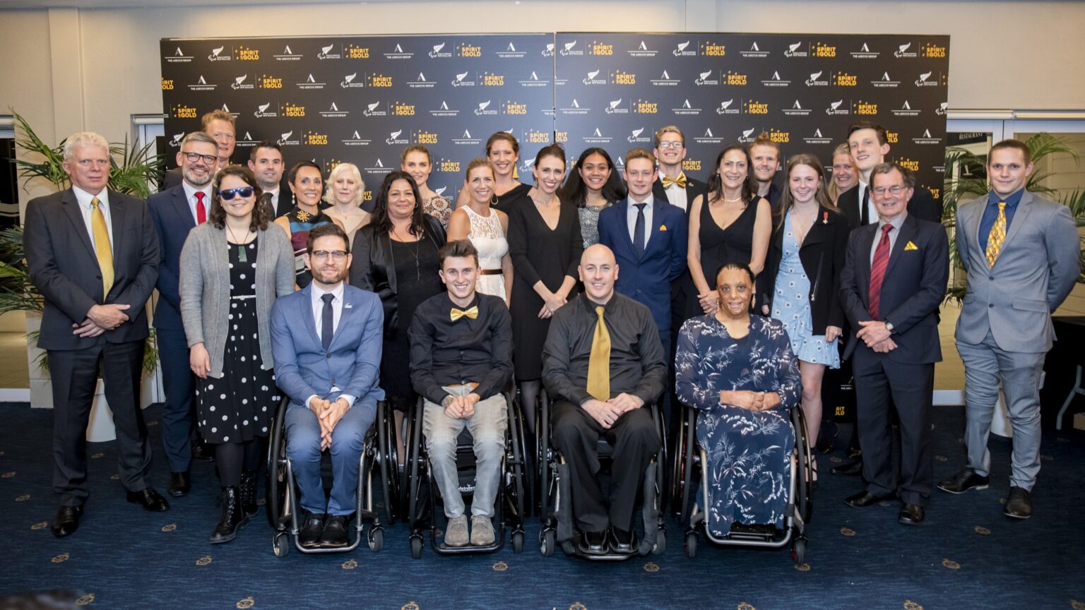 Group of Paralympians Para athletes and Prime Minister Jacinda Ardern