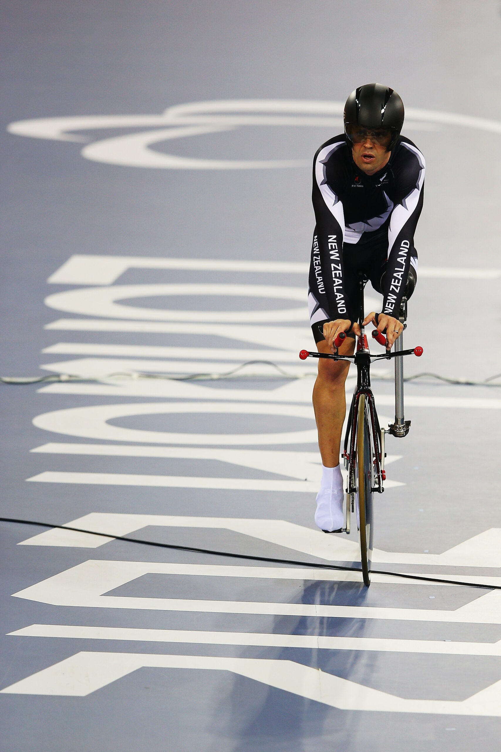 Nathan cycles over London 2012 on floor