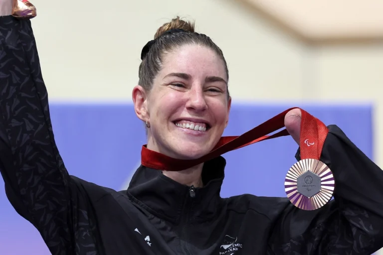Nicole Murray celebrates with her bronze medal at the Paris 2024 Paralympic Games.