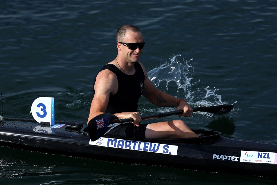 Scott Martlew paddles his canoe at the Paris 2024 Paralympic Games.