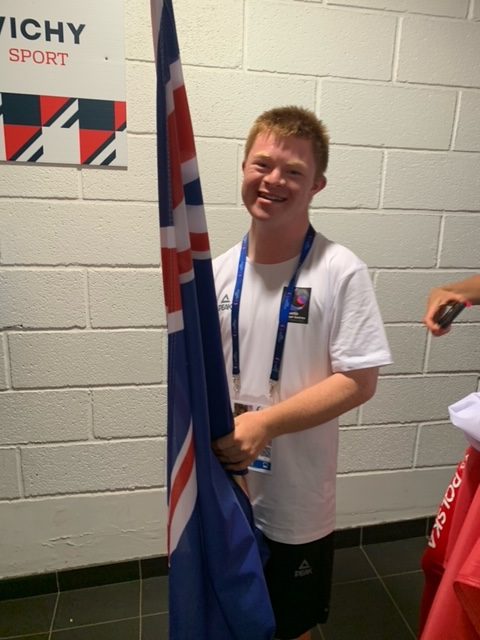 Alfie indoors with NZ flag