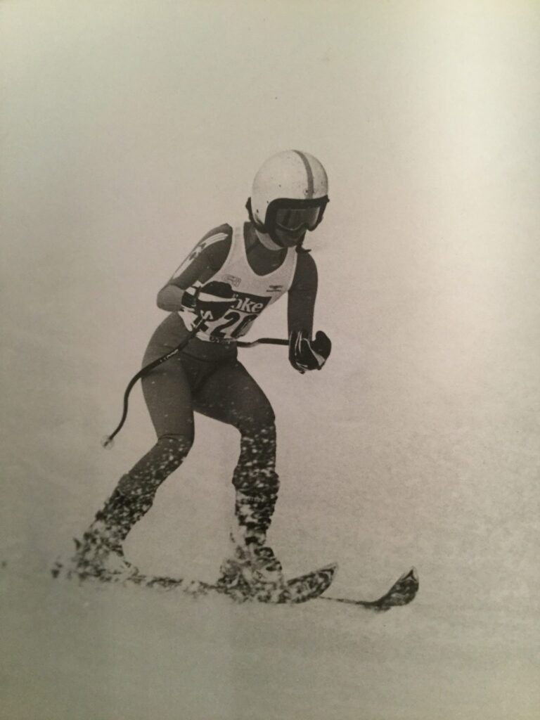 black and white photos of female skier in action