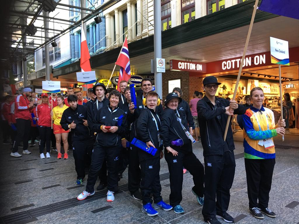 New Zealand athletes with flags at the INAS Global Games in Brisbane in 2019.