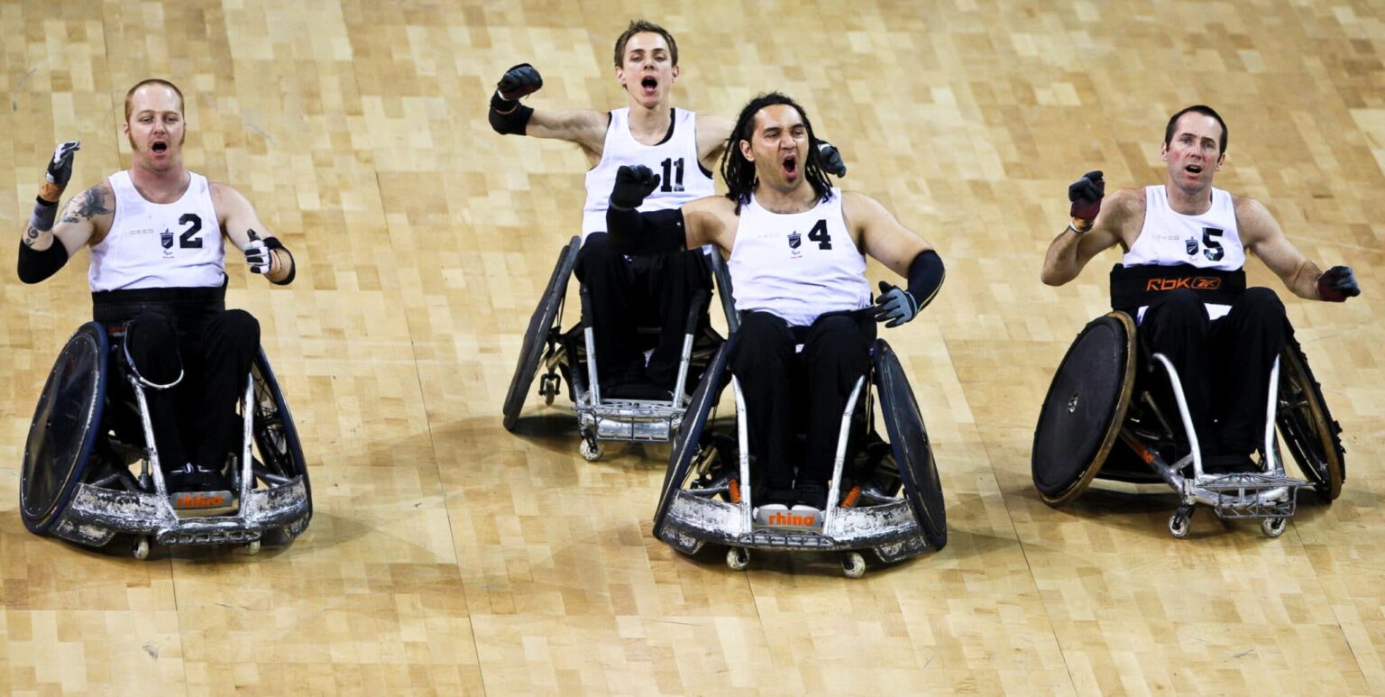 NZ Wheelchair rugby team performing haka on the field