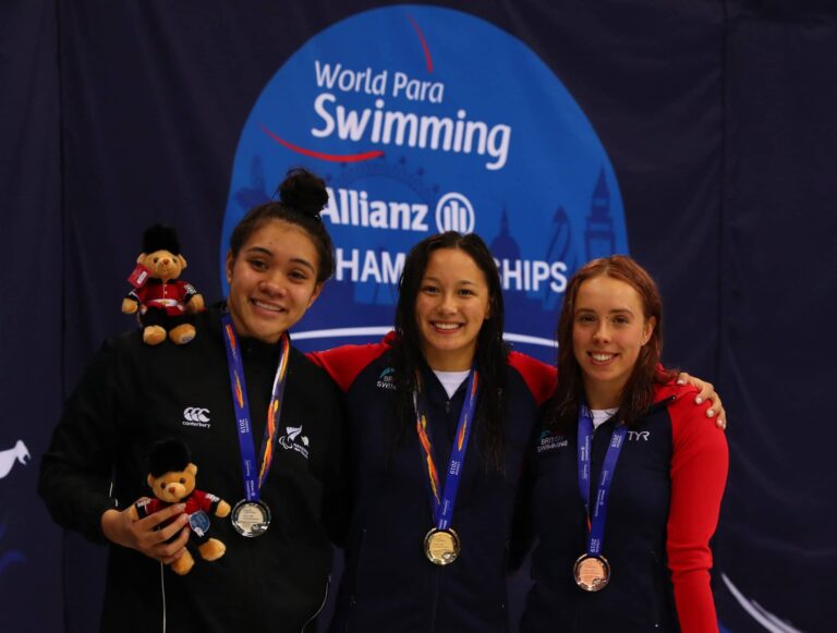 Tupou Neiufi of New Zealand (silver) Alice Tai (gold) and Megan Richter (bronze) of Great Britain with their medals after the 100m Backstroke S8 Final