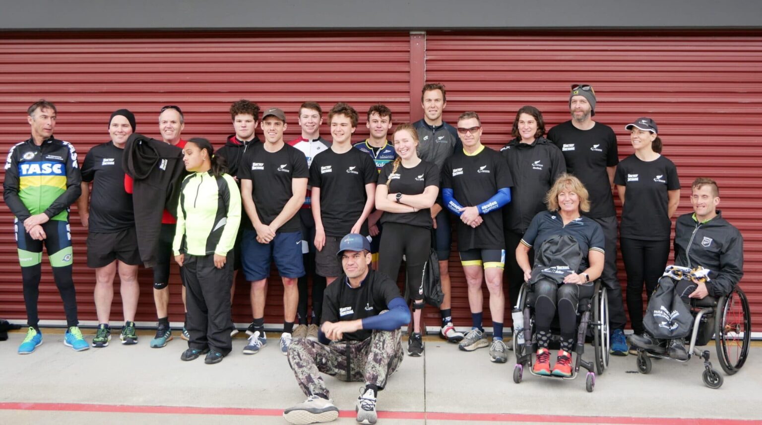 A group photo of Para athletes and coaches