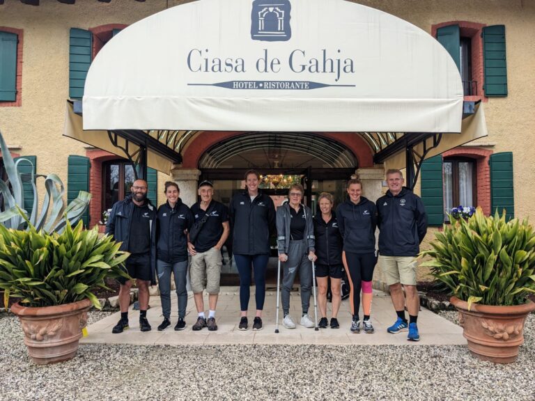 The Para cyclists and support staff outside a restaurant in Italy
