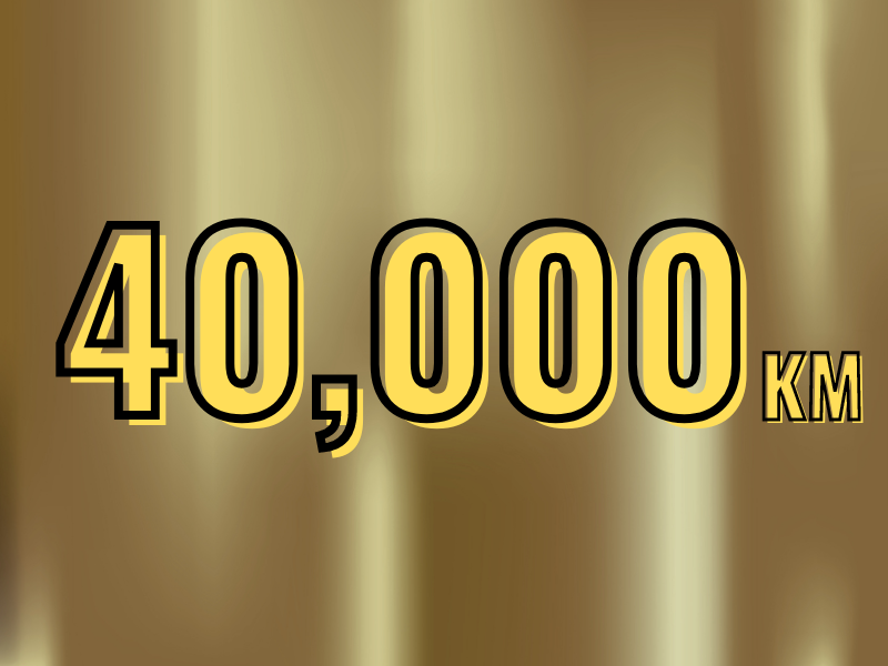 Gold graphic with 40,000km in lively lettering