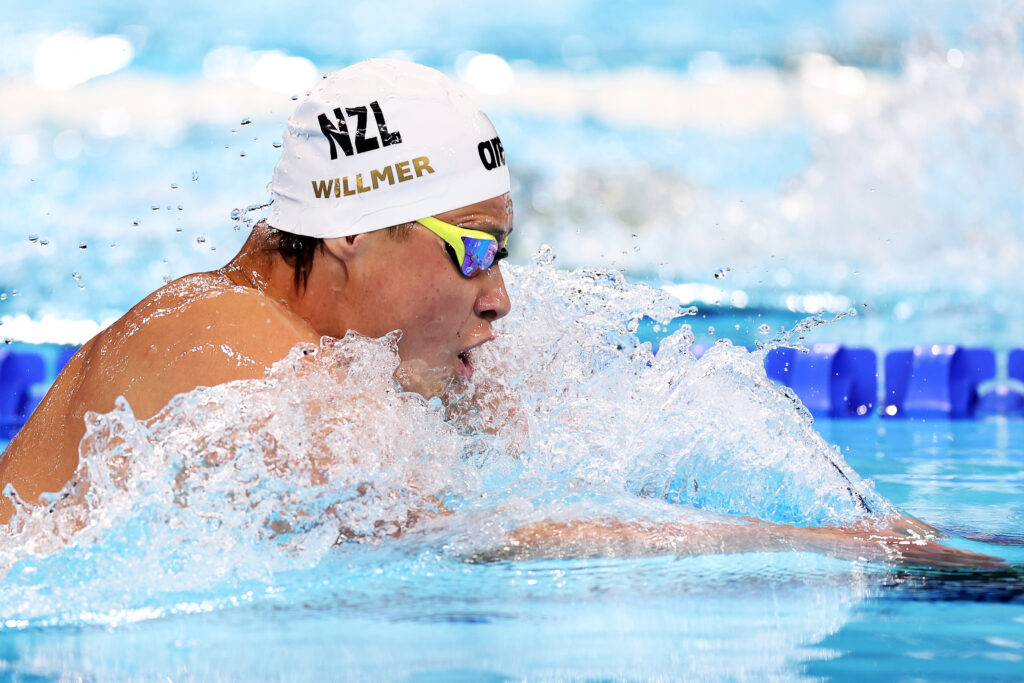 Joshua Willmer emerges from the water mid-stroke as he competes in the Men's 100m Breaststroke SB8 at the Paris 2024 Paralympic Games.