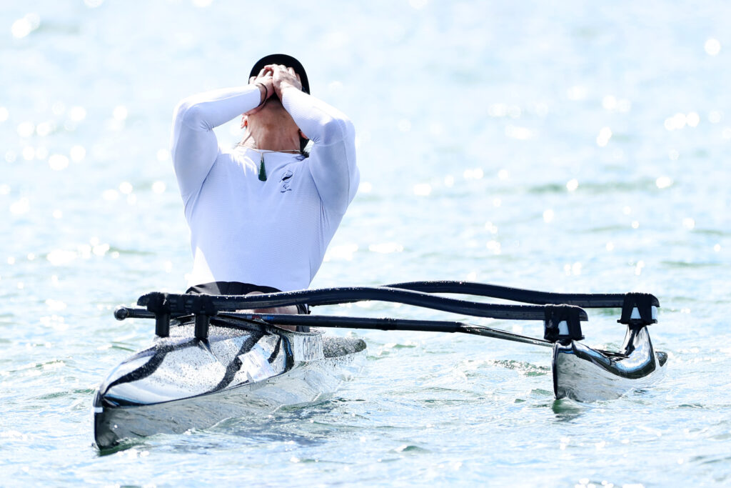 Peter Cowan holds his face in surprise as he wins bronze in he Men's 200m VL3 at the Paris 2024 Paralympic Games.