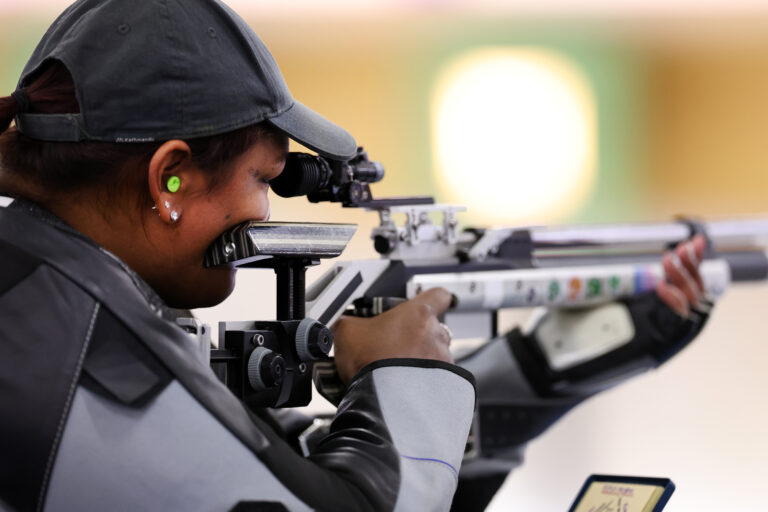 Neelam O'Neill aims her rifle while competing at the Paris 2024 Paralympic Games.