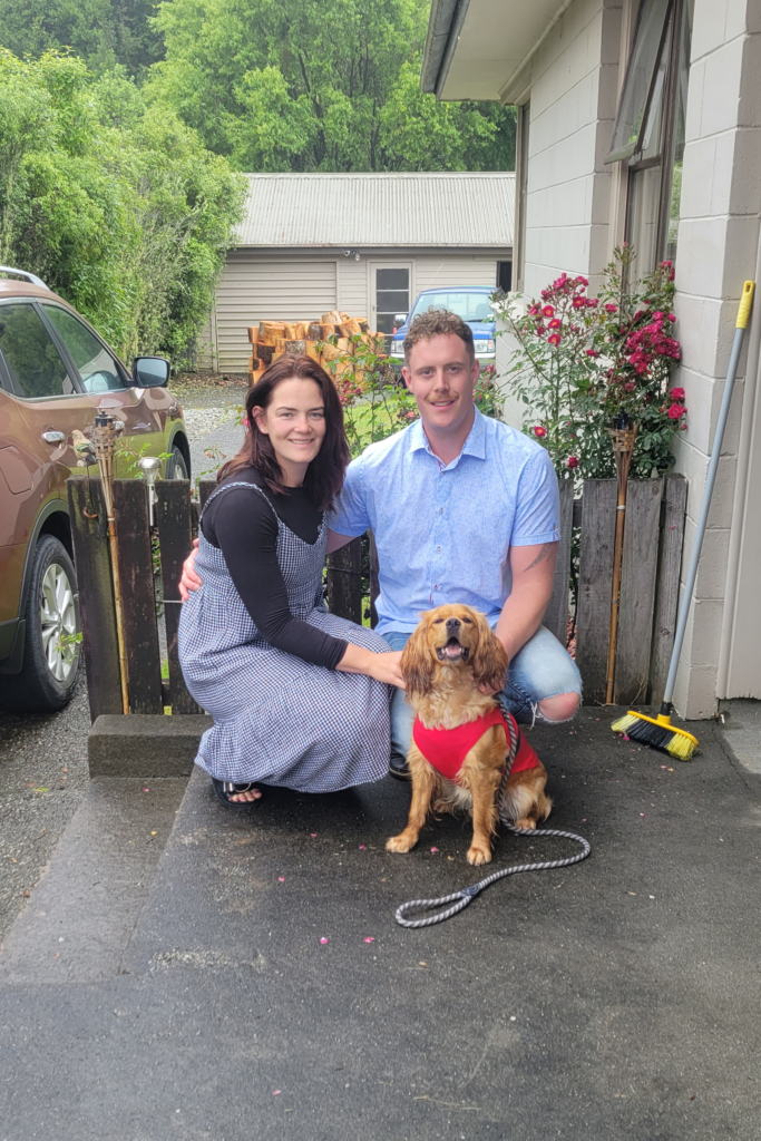 Holly Robinson with fiancé Geoff and their dog Louis. 