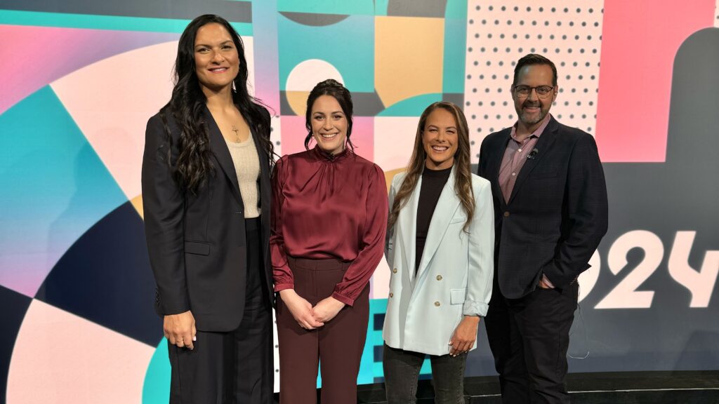 Three Dames Valerie Adams, Sophie Pascoe and Lisa Carrington stand alongside broadcaster Scotty Stevenson in the TVNZ studio for the Paris 2024 Paralympic Games