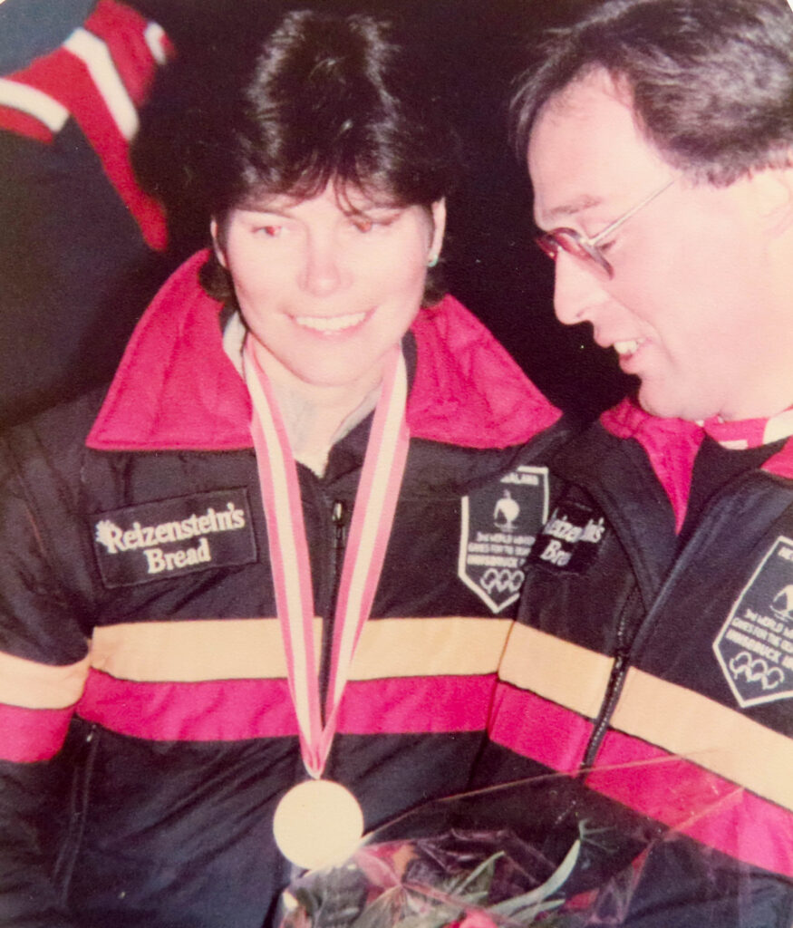 Vivienne Gapes wins gold alongside her sighted guide Mike Curzon at the 1984 Paralympic Winter Games