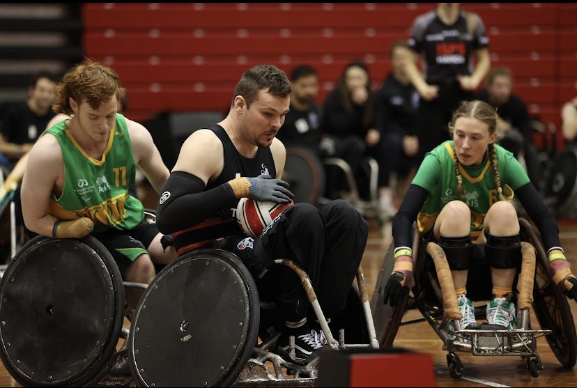 Keenan Alexander plays for the Wheel Blacks against Australia. 