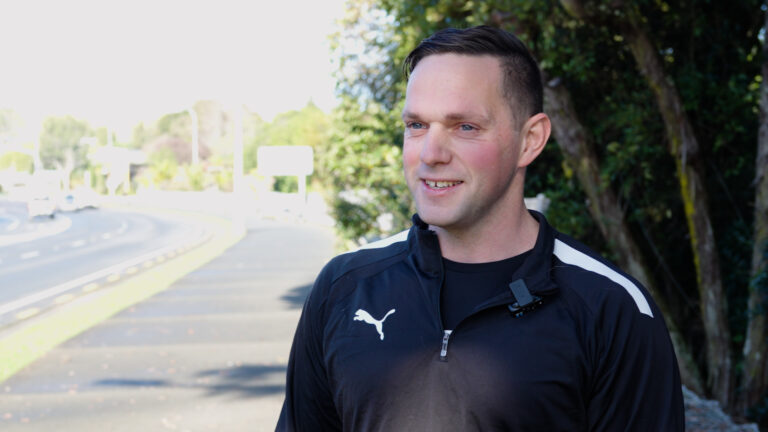 Mitch Joynt smiles on the pavement where it all began for him.