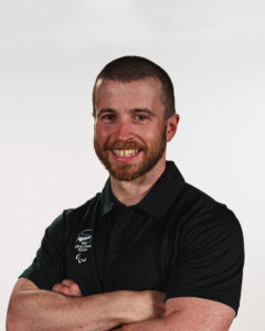 A portrait of Sam Lynch on a white background.