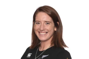 A formal headshot of Anna Taylor in front of a white background.