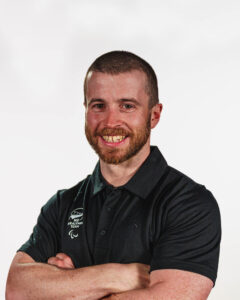 A portrait of Sam Lynch on a white background.