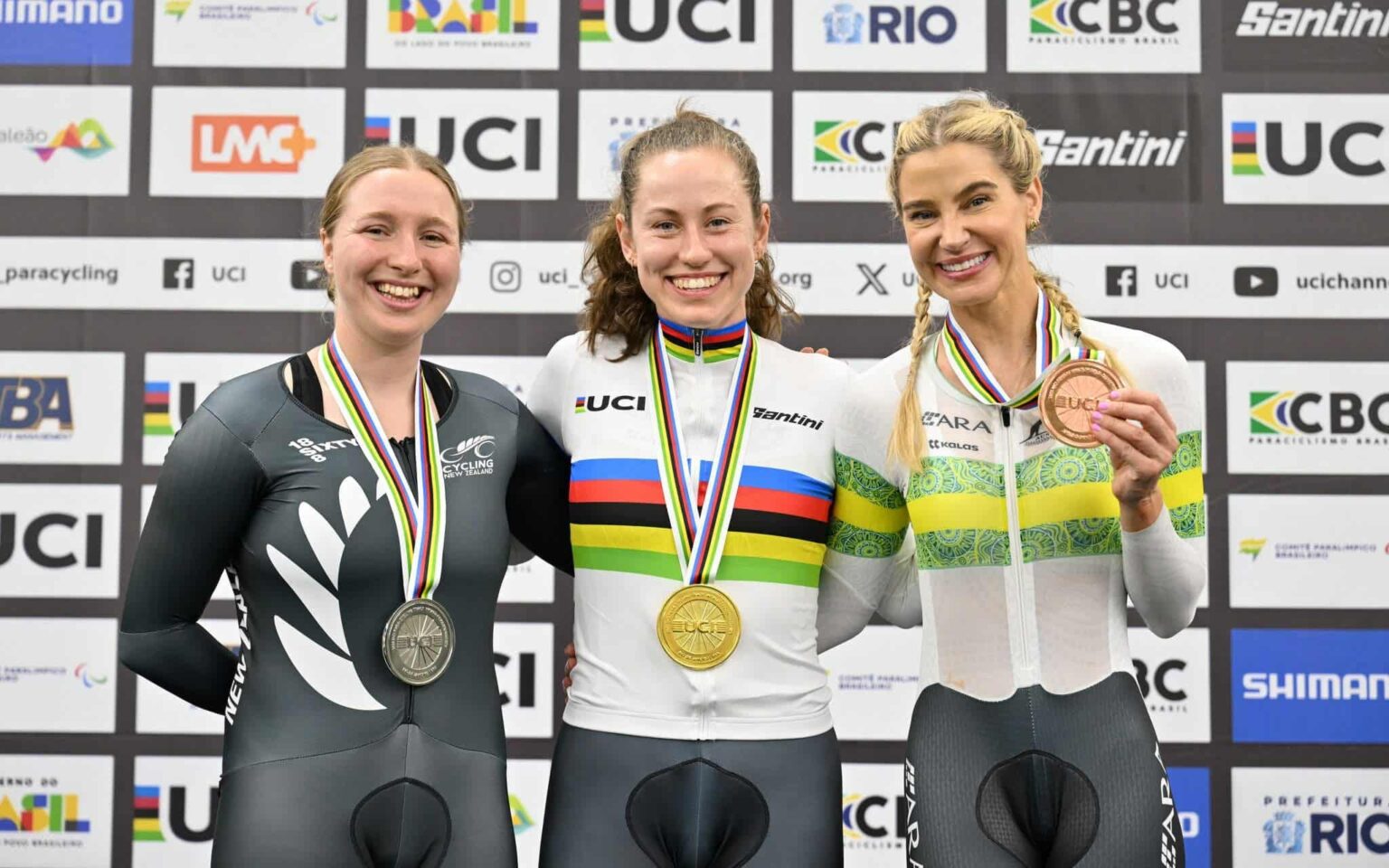 Siobhan celebrates her silver medal on the podium of the 2025 UCI Para cycling Track world championships.