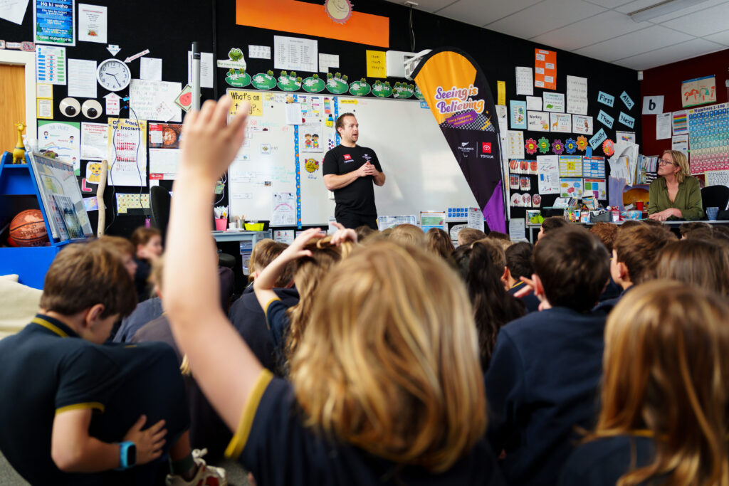 Paralympian #158 Adam Hall speaks to a class of school children.