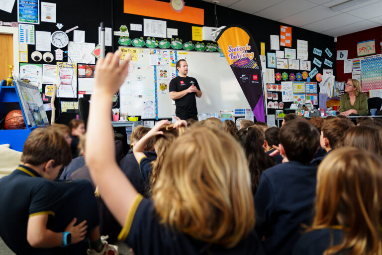 Paralympian #158 Adam Hall speaks to a class of school children.