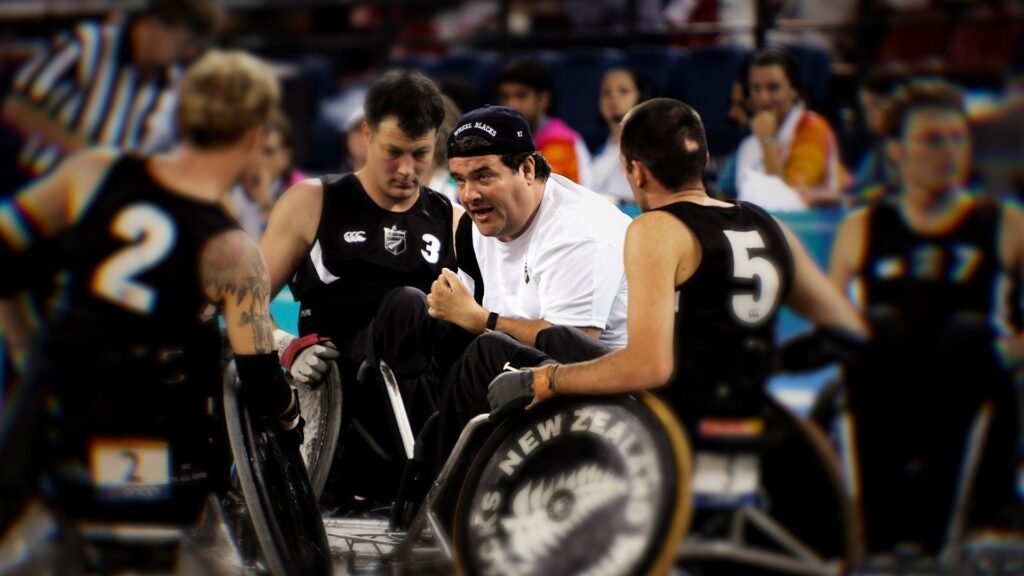 Grant Sharman talks to the Wheelblacks during a game at the Athens 2004 Paralympic Games.