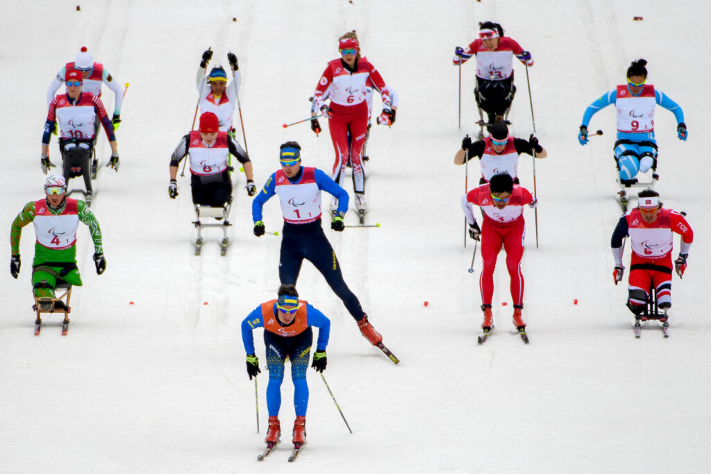 A group of skiers take off at the start of the Cross Country skiing.