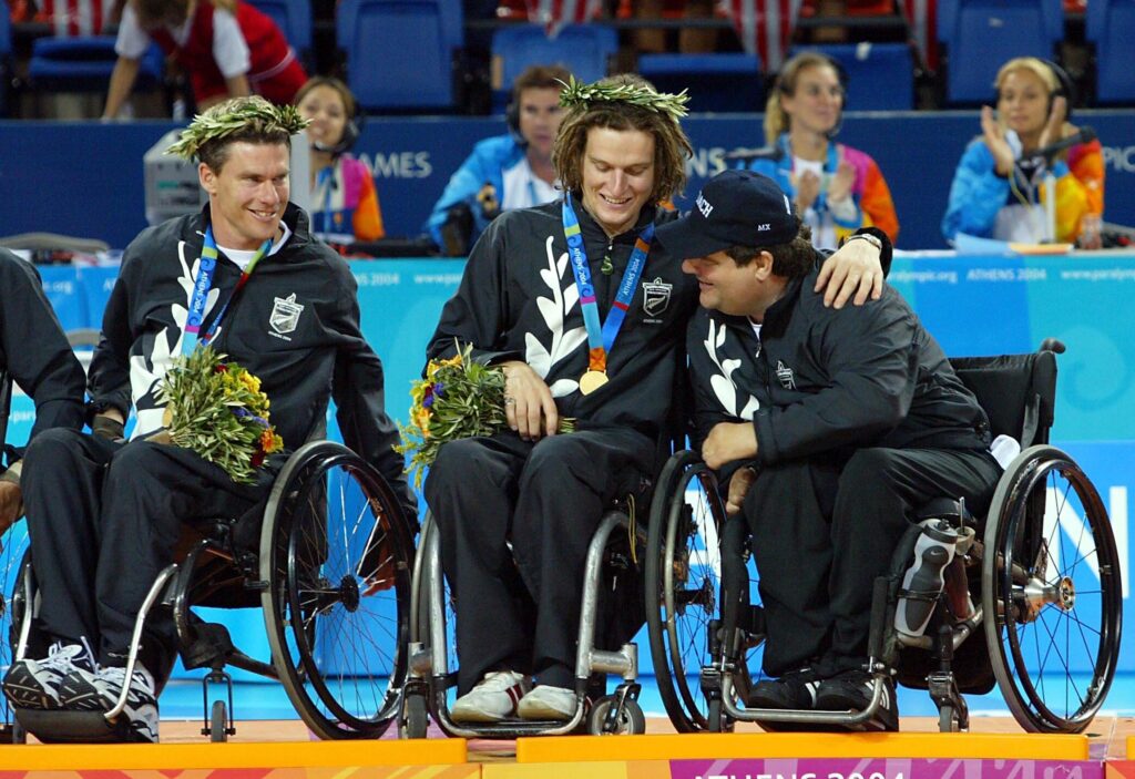 Grant celebrating with the Team during the medal ceremony.