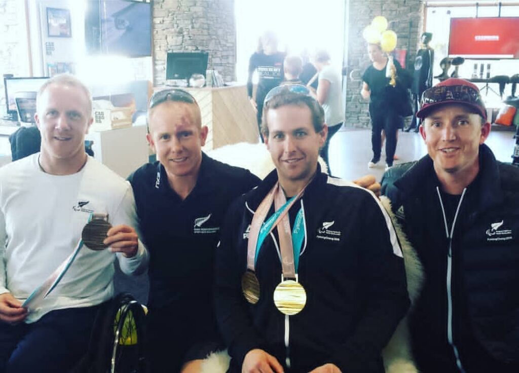 Matty Graham takes a photo with the NZ Paralympic Team for Pyeongchang 2018. Corey Peters, Adam Hall and Carl Murphy.