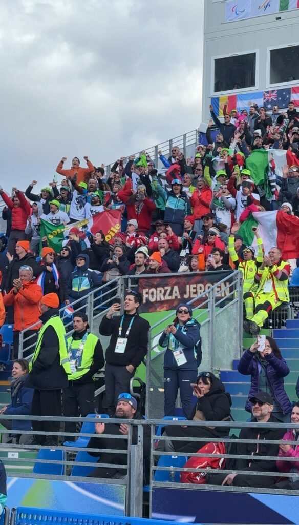 supporters in the crowd shouting out