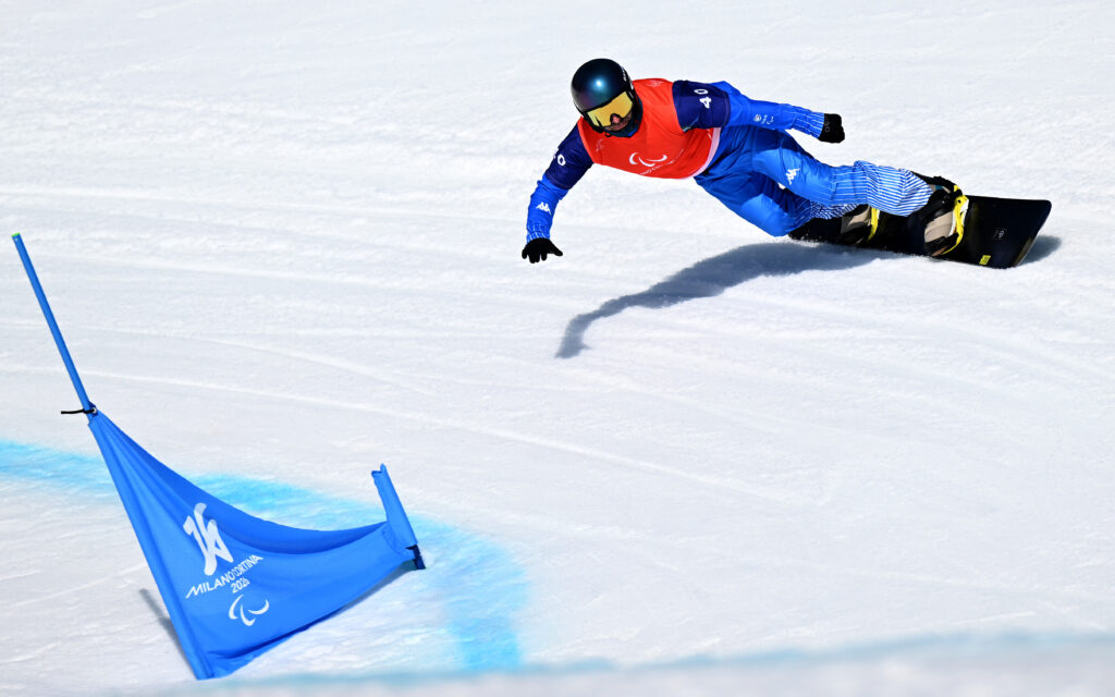 Emanuel Perathoner of Team Italy competes in the Men's Para Snowboard Cross at Milano Cortina 2026.