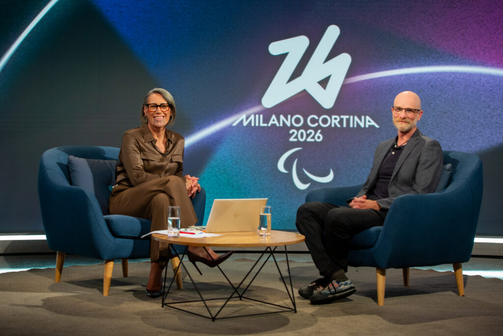 Steven Bayley sits in the TVNZ studio with host Jenny-May Clarkson.