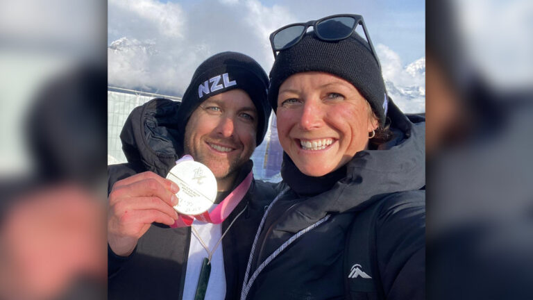 Helen Barron takes a selfie with Adam Hall holding his silver medal.