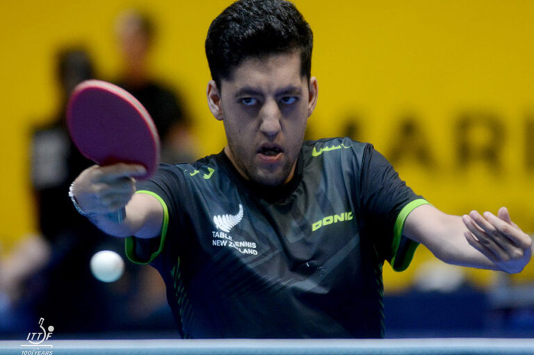 Matthew Britz hits a ball in a game of Para table tennis.