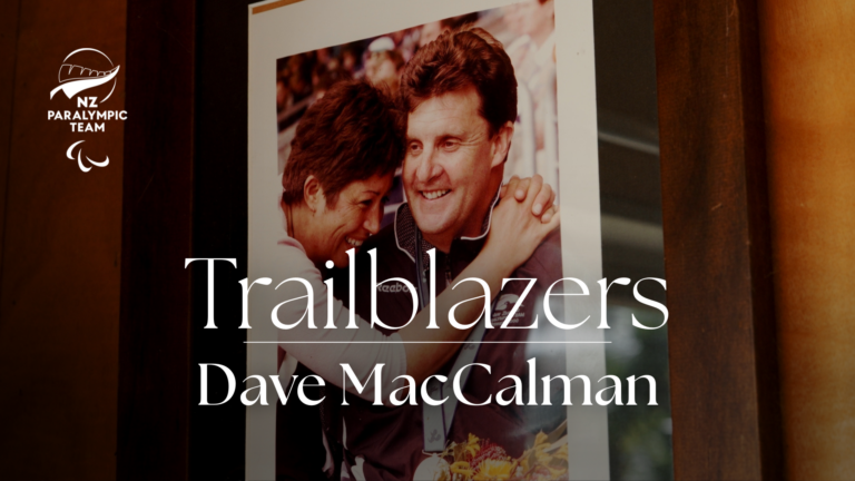 A photo of Dave MacCalman framed on a wall. Text overlaid reads Trailblazer.