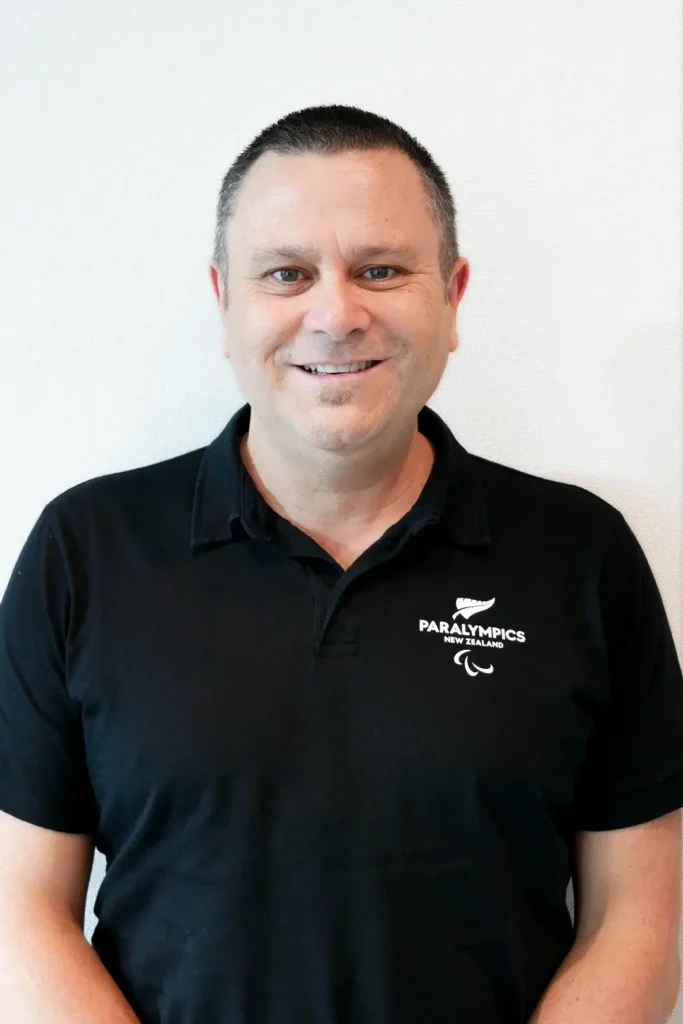 A portrait photo of Greg Warnecke.
