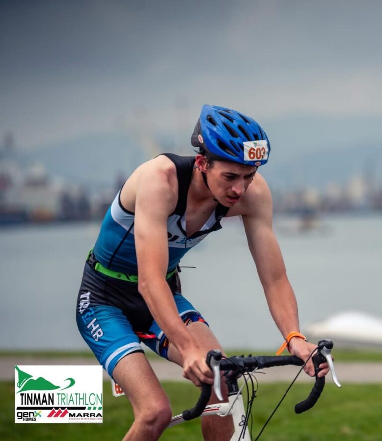 Guy cycles during a Para triathlon.