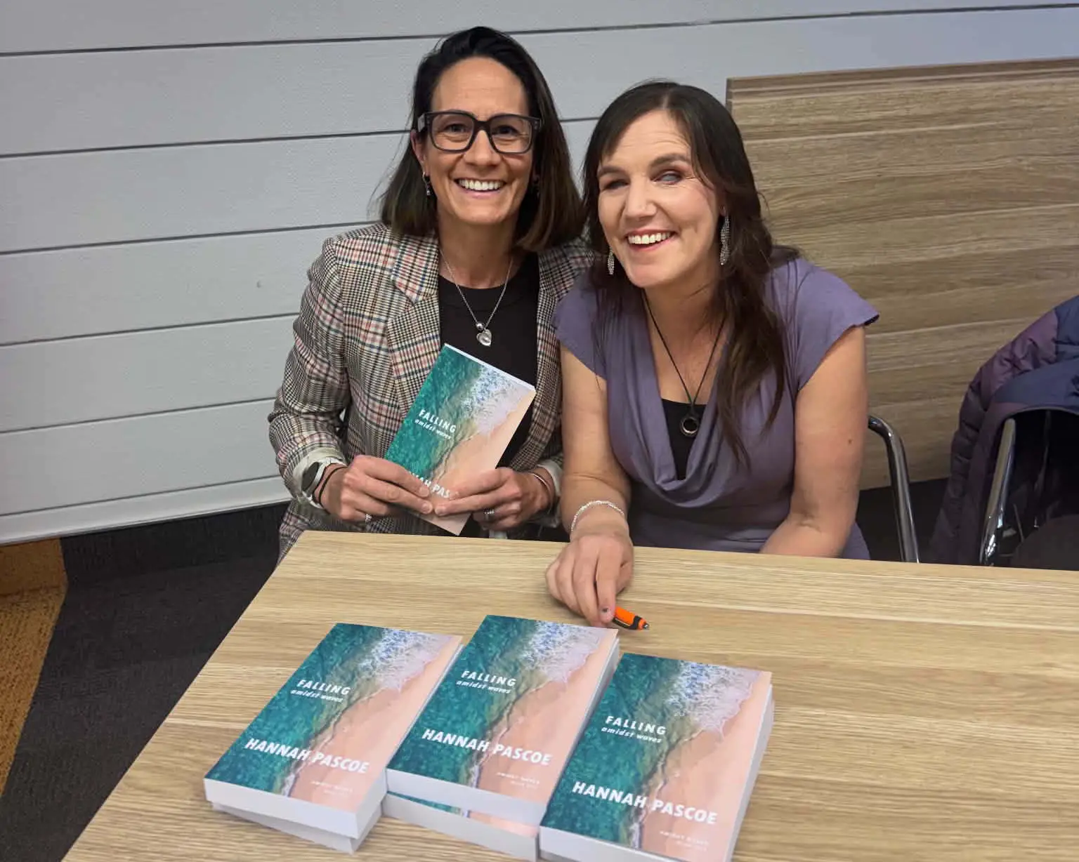 Hannah Pascoe takes a photo at the launch of her new book.