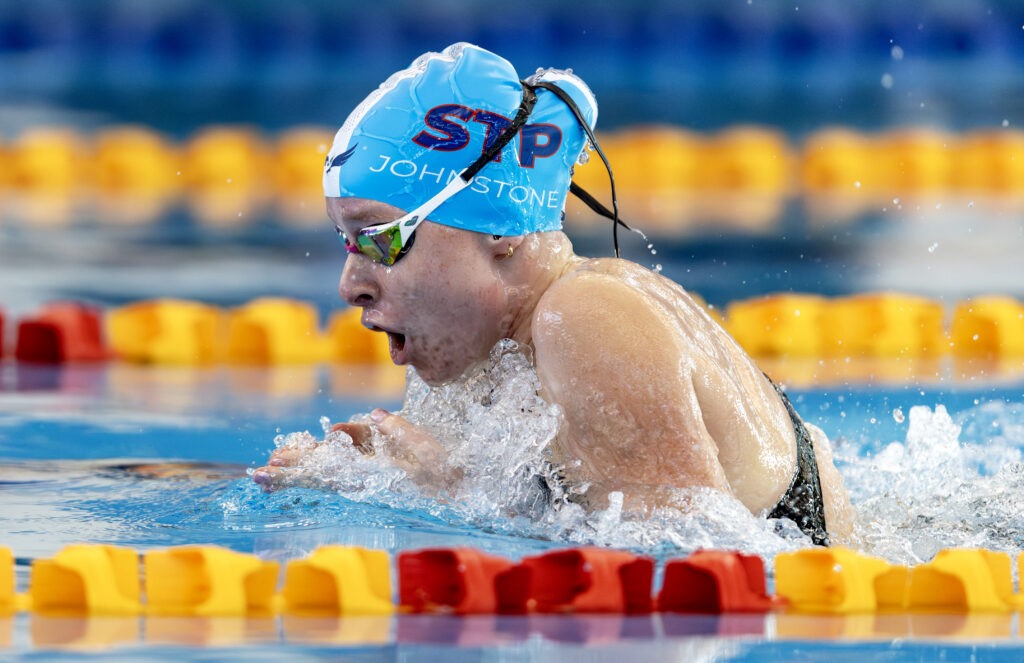 Jessica Johnstone swims in a pool.