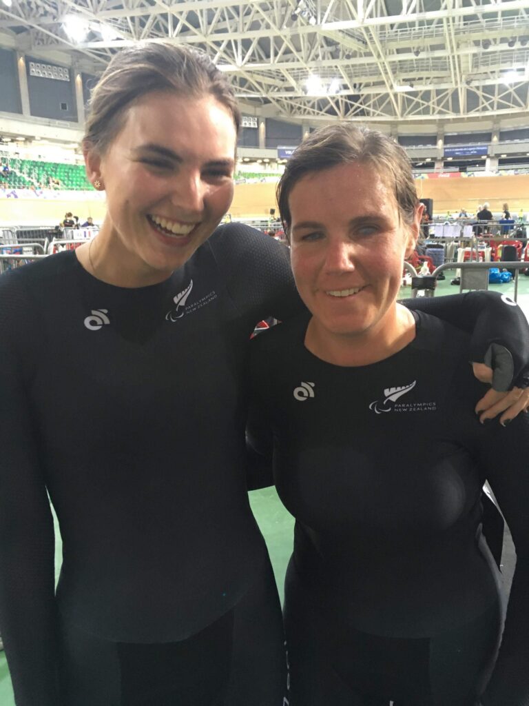 Hannah Pascoe takes a photo with pilot Nina Wolaston at the Rio 2018 Para Cycling Track World Championships.