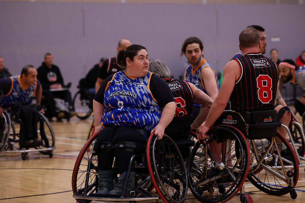 Daniella Egle-Bast defends in a game of Wheelchair Basketball. 
