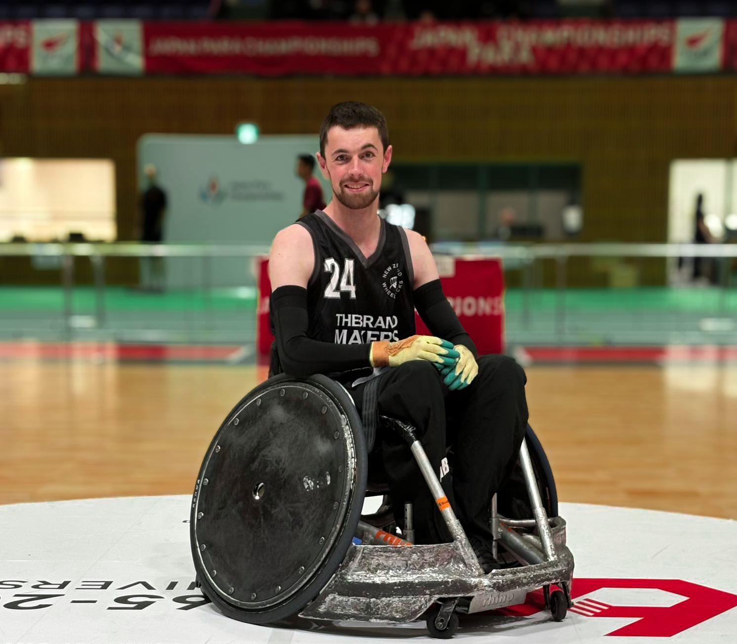 Michael Barry poses for a photo on court at the Japan Para Championships.